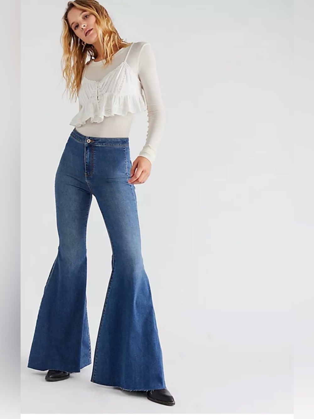 Free People "Just Float On" flare jeans a high-rise waist and bell bottom 31